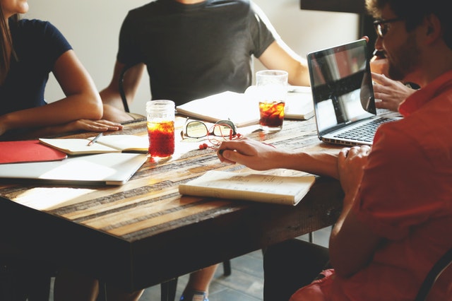 people at a startup recruitment agency meeting