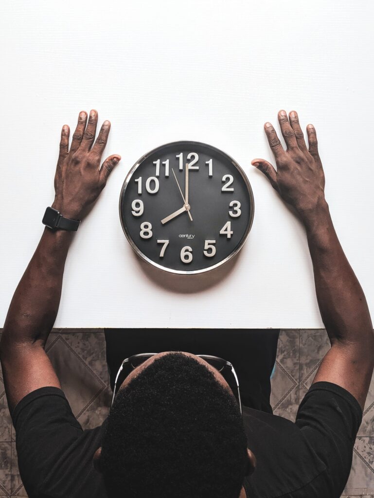 clock hands on table