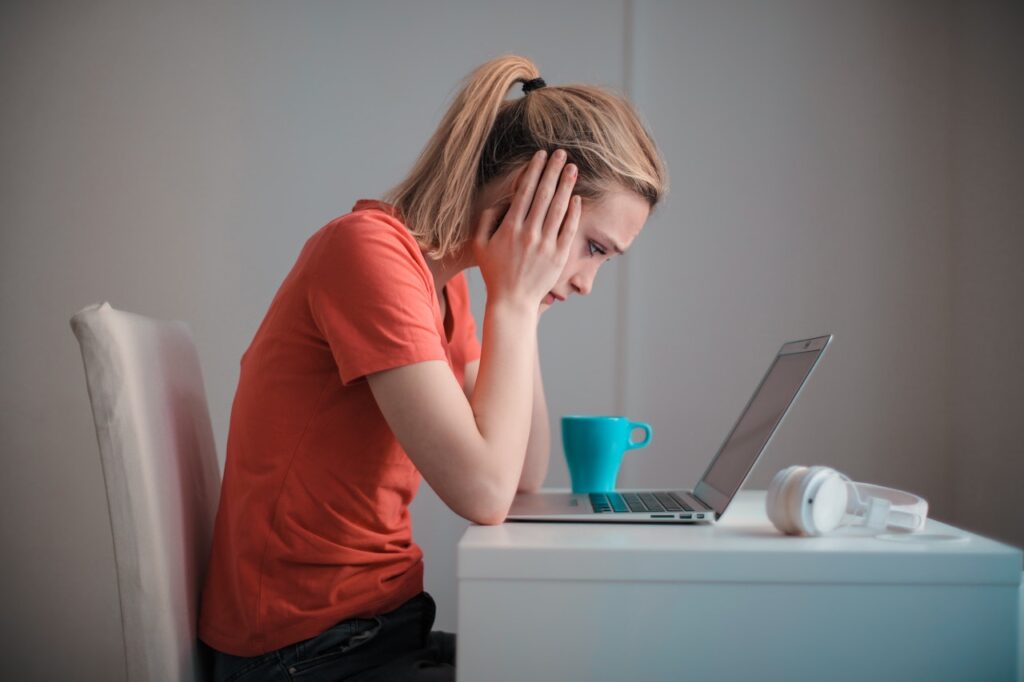 woman looking despairing